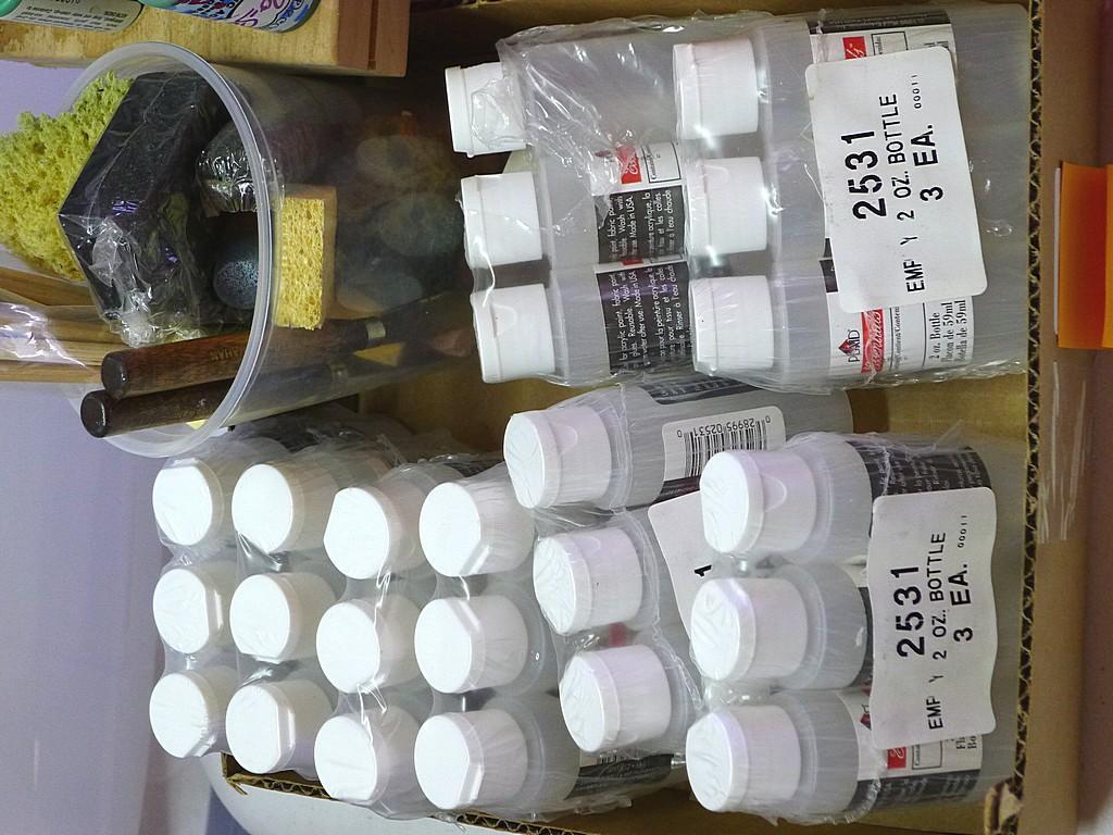 Nice assortment of craft paint, brushes, empty bottles, storage case and more. Paint includes Folk