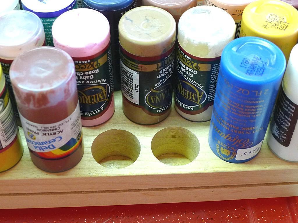 Nice assortment of craft paint, brushes, empty bottles, storage case and more. Paint includes Folk