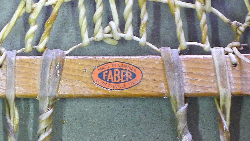 Faber snowshoes with bindings made in Canada. 10" x 56". Lacing has be well repaired. Nice