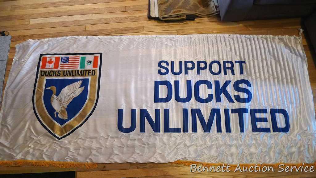 Support Ducks Unlimited banner is 3-1/2' x 8-1/2' and in good condition.