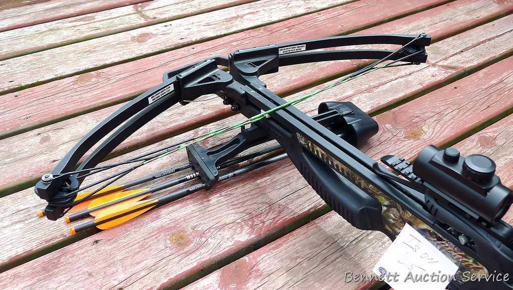 Barnett Jackal cross bow with three bolts, quiver, cocking string and Barnett triple dot optic.