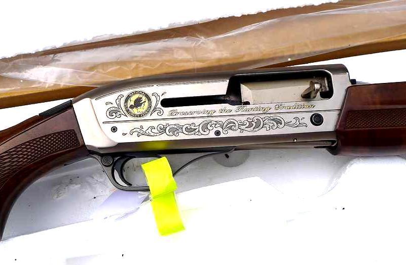 Winchester SuperX3 semi automatic 12 gauge National Wild Turkey Federation shotgun with a burst
