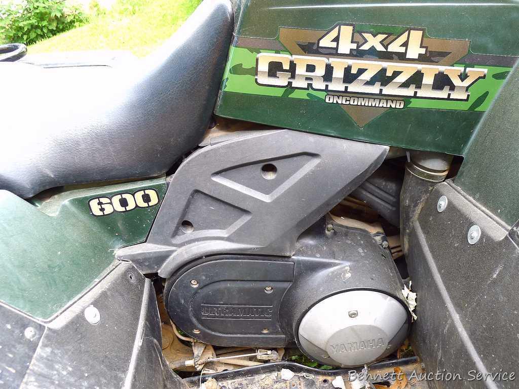 Yamaha Grizzly 4 x 4 ATV, 600cc with on demand 4 wheel drive, winch and 5 ft. snowplow. Machine