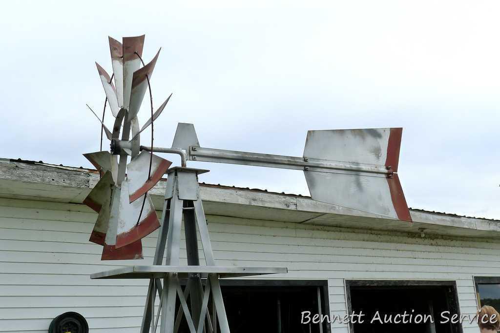 Windmill lawn decoration is 8' tall x approx. 3'. Appears in nice shape.