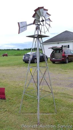 Windmill lawn decoration is 8' tall x approx. 3'. Appears in nice shape.