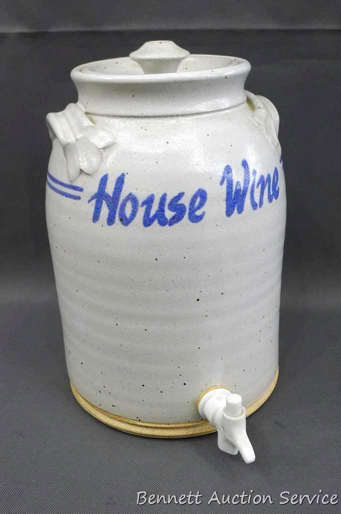 House Wine ceramic jug with pour spout is 7" dia. X 11" tall and was donated by Andrew Mondeik. No