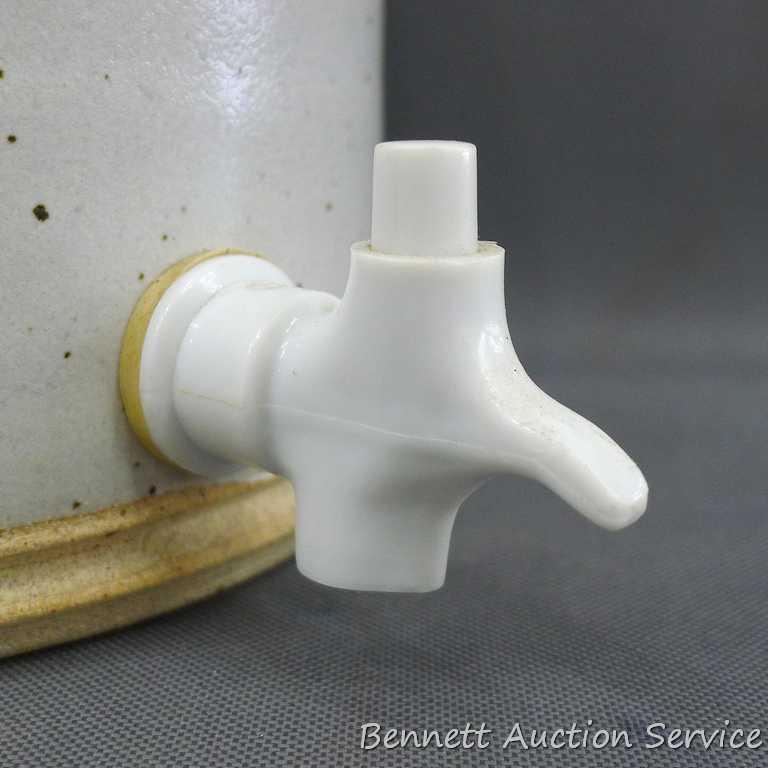 House Wine ceramic jug with pour spout is 7" dia. X 11" tall and was donated by Andrew Mondeik. No