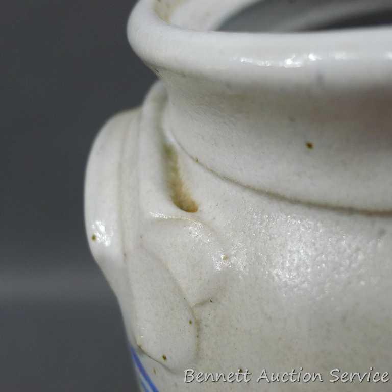 House Wine ceramic jug with pour spout is 7" dia. X 11" tall and was donated by Andrew Mondeik. No