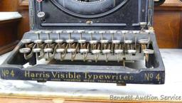 Antique Harris Visible typewriter No. 4 is 17" x 14" x 9" tall was donated by De-Mon Racing.