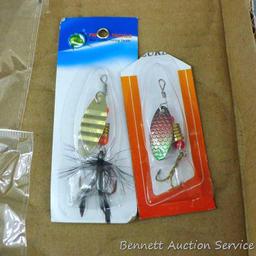 Assortment of NIP fishing lures are 3-1/4" long and are donated by BS Sports.