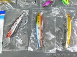 Assortment of NIP fishing lures are 3-1/4" long and are donated by BS Sports.