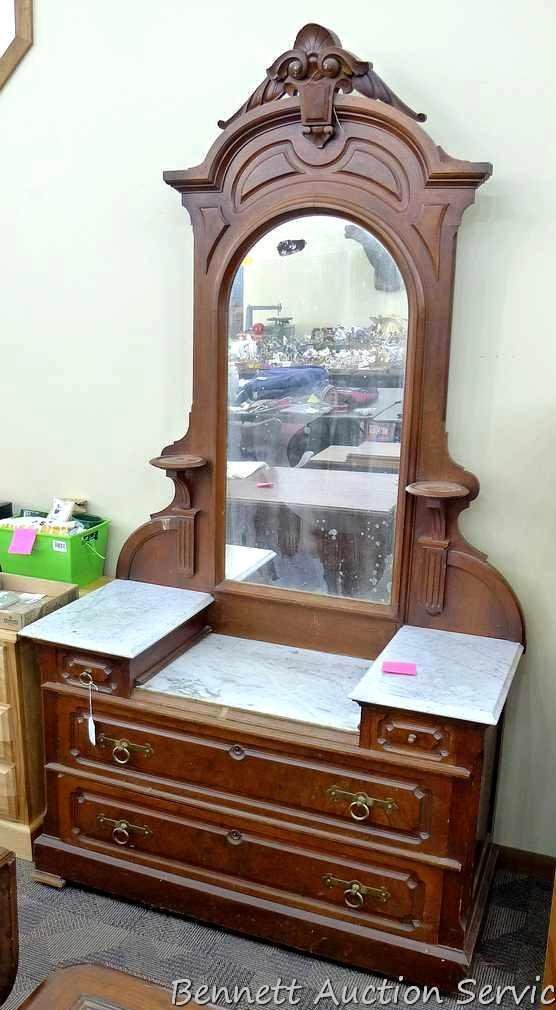 Antique marble topped vanity or dresser with mirror. Mirror silvering has streaking and other