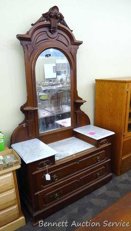 Antique marble topped vanity or dresser with mirror. Mirror silvering has streaking and other