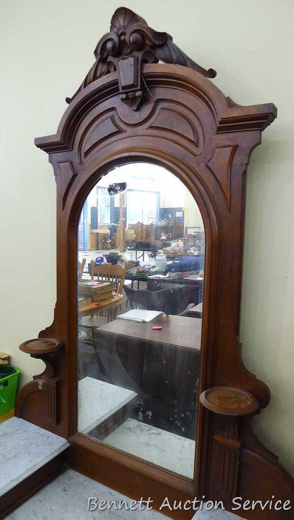 Antique marble topped vanity or dresser with mirror. Mirror silvering has streaking and other