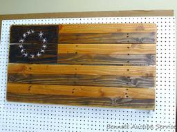 Handmade wooden American flag is 21" x 38" and was donated by De-Mon Racing.