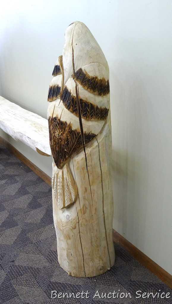 Chainsaw carved eagle shelf is 51" tall x 88" long x 11" deep and is donated by Andrea & Kevin