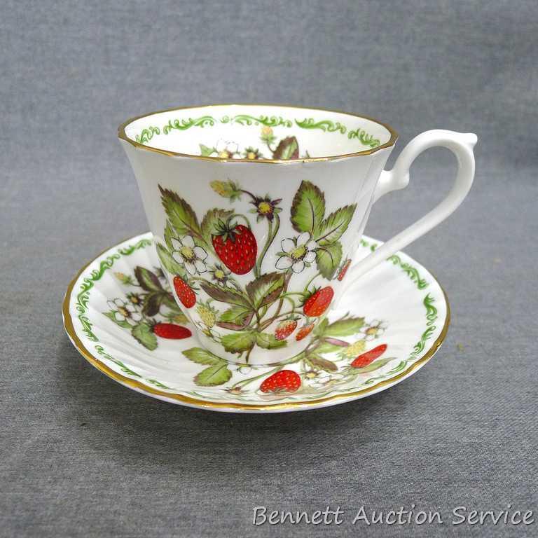 Strawberry patterned Fine Bone China tea cup with saucer was made in England, marked 'Royal Kendal'.