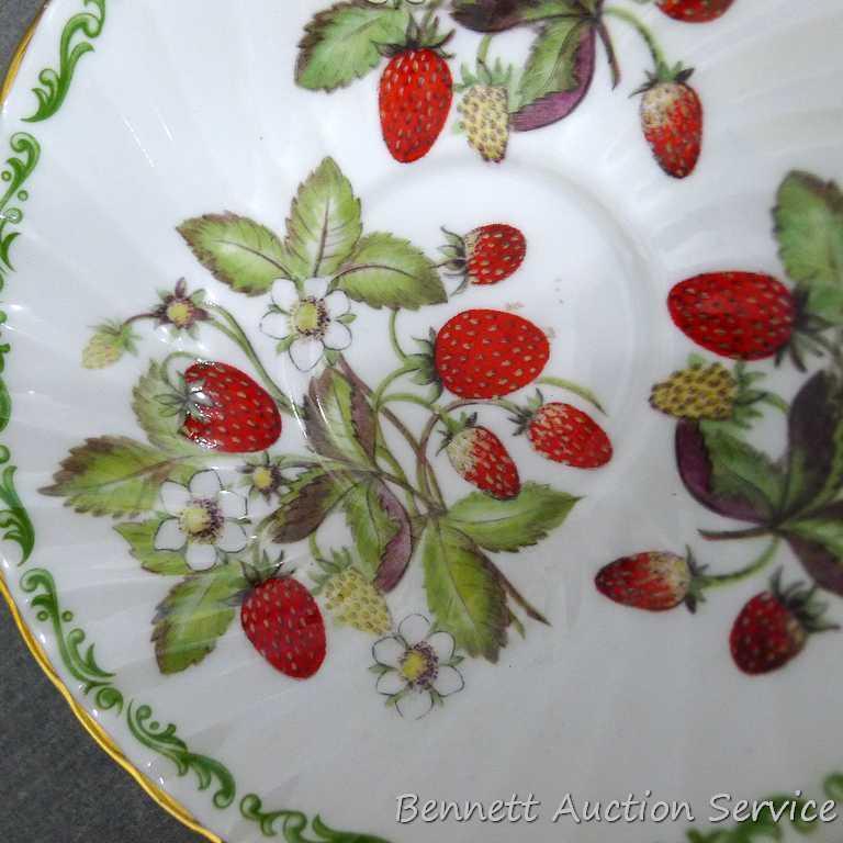 Strawberry patterned Fine Bone China tea cup with saucer was made in England, marked 'Royal Kendal'.