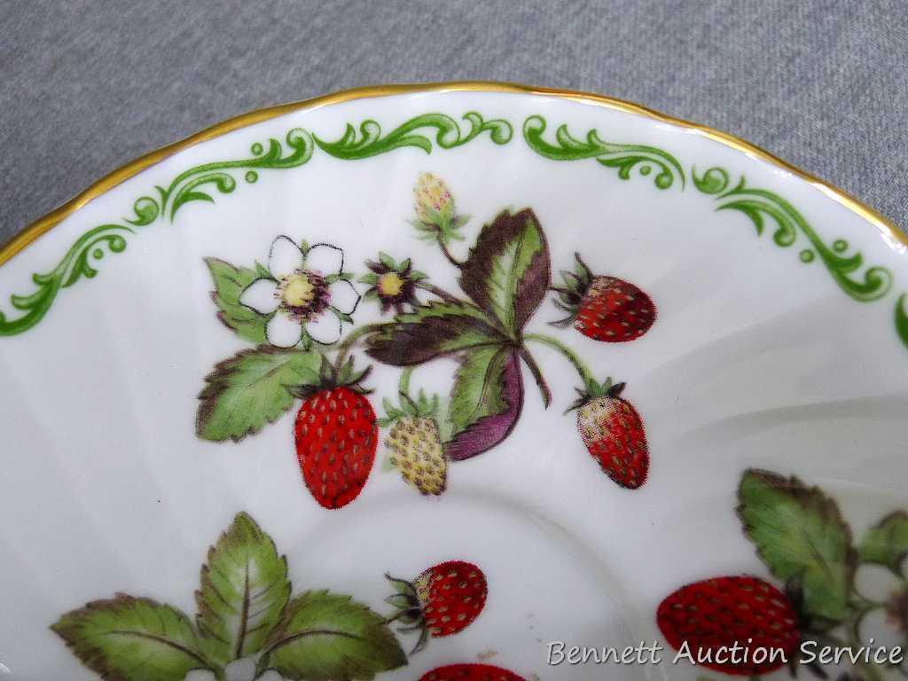 Strawberry patterned Fine Bone China tea cup with saucer was made in England, marked 'Royal Kendal'.