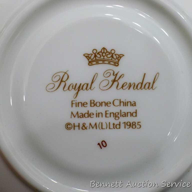 Strawberry patterned Fine Bone China tea cup with saucer was made in England, marked 'Royal Kendal'.