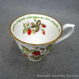 Strawberry patterned Fine Bone China tea cup with saucer was made in England, marked 'Royal Kendal'.