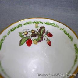 Strawberry patterned Fine Bone China tea cup with saucer was made in England, marked 'Royal Kendal'.