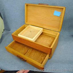 Wooden jewelry box; has a tray in the top compartment; box measures 13-3/4" x 7-1/2" x 6".