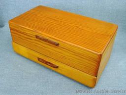 Wooden jewelry box; has a tray in the top compartment; box measures 13-3/4" x 7-1/2" x 6".