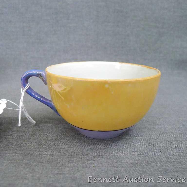 Cup and saucer hand painted in Japan, saucer measures 5-1/2" diameter, cup is 3-1/2" diameter by 2"