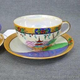 Cup and saucer hand painted in Japan, saucer measures 5-1/2" diameter, cup is 3-1/2" diameter by 2"