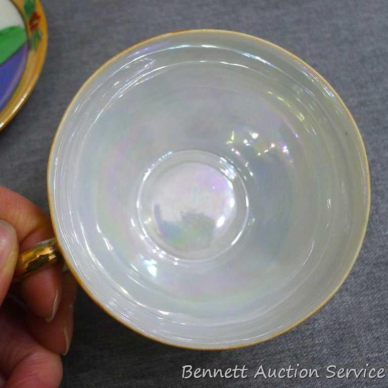 Cup and saucer hand painted in Japan, saucer measures 5-1/2" diameter, cup is 3-1/2" diameter by 2"