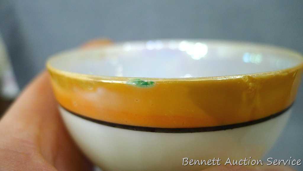 Cup and saucer hand painted in Japan, saucer measures 5-1/2" diameter, cup is 3-1/2" diameter by 2"