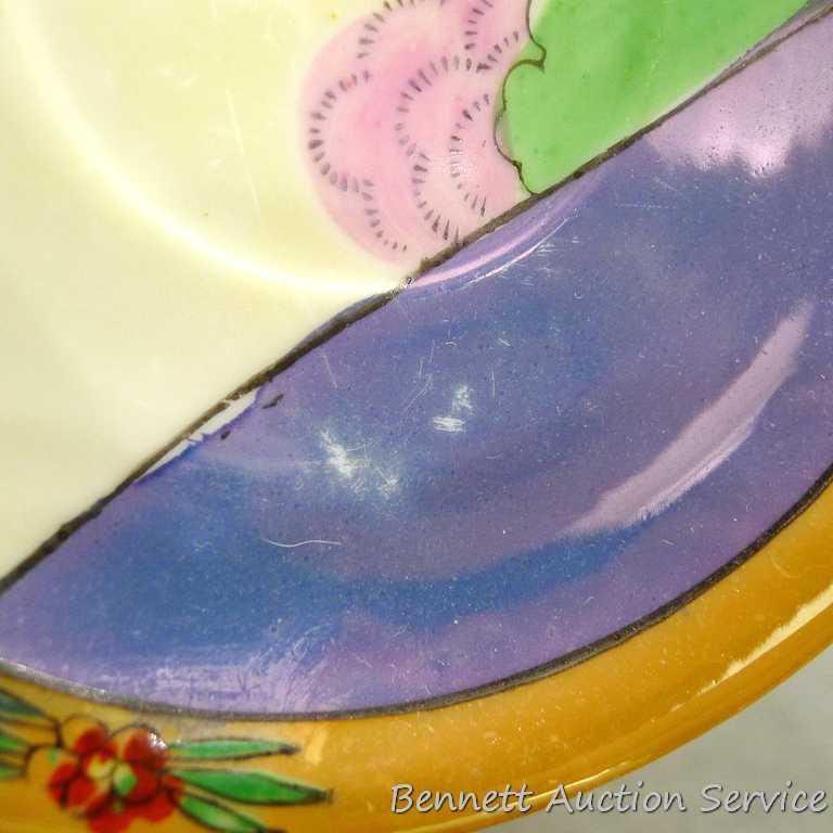 Cup and saucer hand painted in Japan, saucer measures 5-1/2" diameter, cup is 3-1/2" diameter by 2"