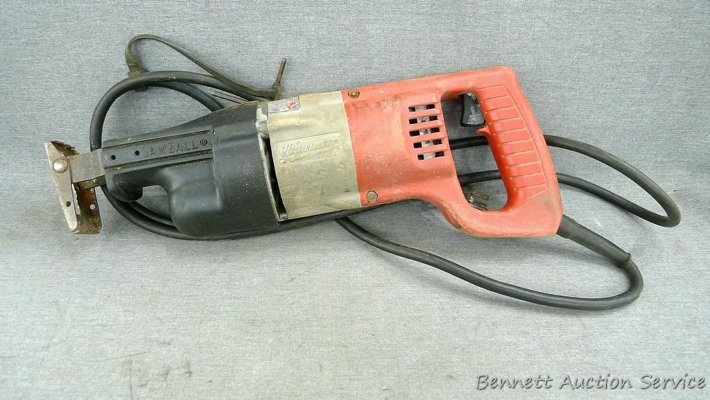 Milwaukee Sawzall runs and comes with metal case and some old blades.
