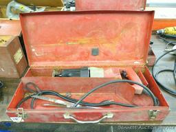 Milwaukee Sawzall runs and comes with metal case and some old blades.