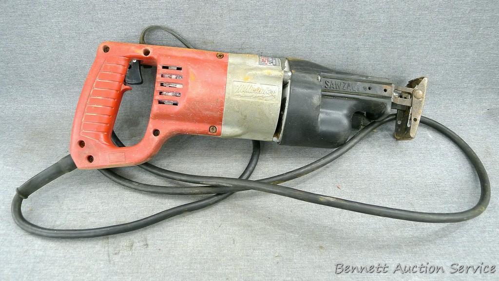 Milwaukee Sawzall runs and comes with metal case and some old blades.