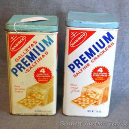 Two vintage Nabisco Premium saltine cracker tins are in overall good shape. Stand 9" tall.