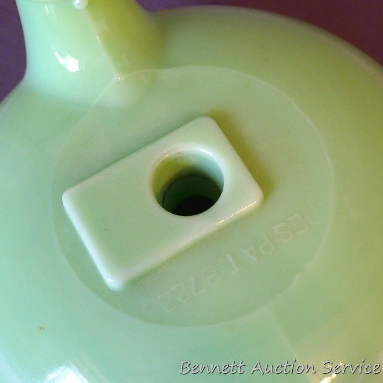Pretty milky green glass juicer attachment as pictured. Measures 7" diameter.