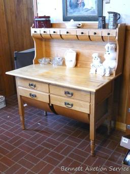Really cool antique maple or similar baker's counter or cabinet. Has rounded bottom bins and upper