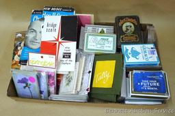 Bridge anyone? This lot is for you, it has several decks of cards and plenty of tally sheets, and a