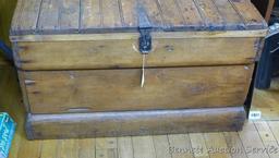 Rustic wooden trunk; measures 32-1/2" x 19" x 19" tall. Very well made, opens and closes easily.
