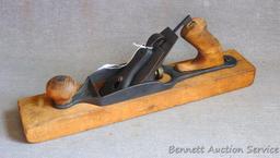 Stanley transitional plane is 15" long. Nice condition with a chipped handle.