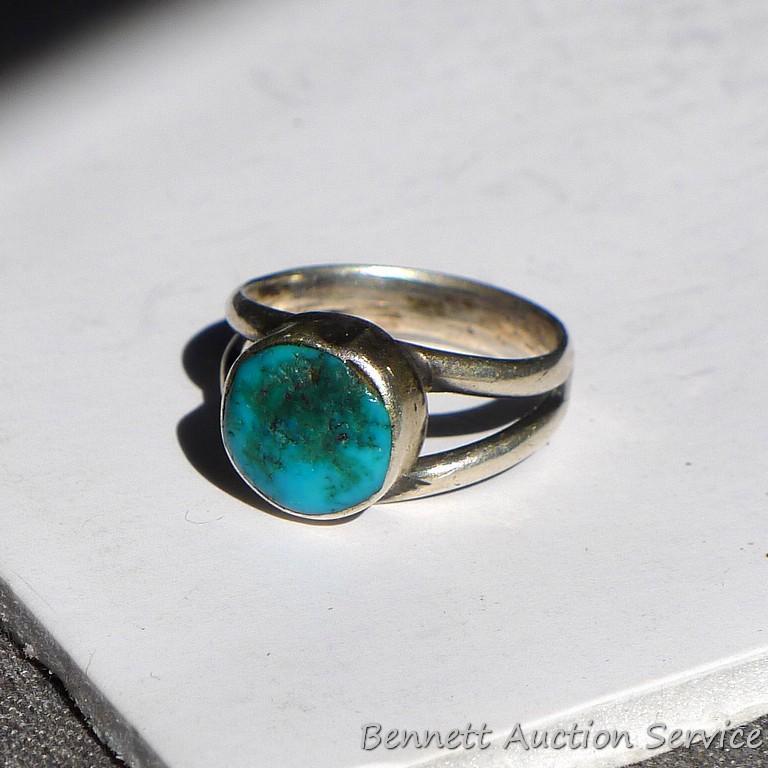 Ladies ring with turquoise accent is about a ladies size 8. No markings found.