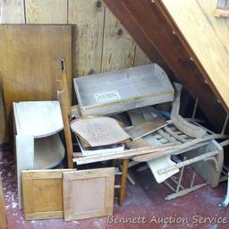 Furniture pieces and parts ready to be repurposed. There appears to be most of a 3-1/2' square solid