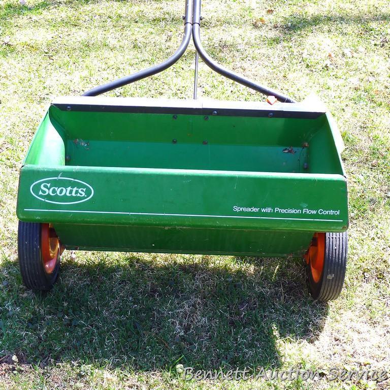 Scotts spreader has a 2' wide bin and looks to be in good shape.