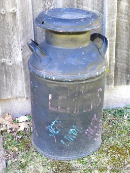 Nice painted milk can stands 2' tall.