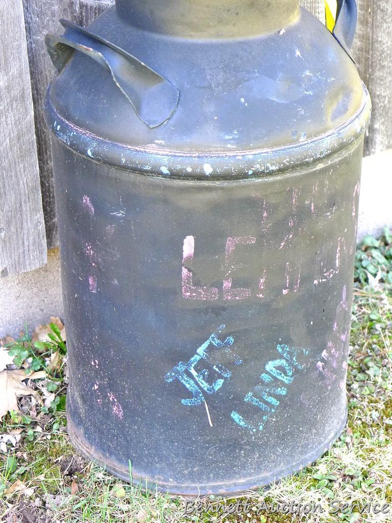 Nice painted milk can stands 2' tall.