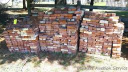 Pile of soft red brick came from the long gone Price County jail and Washington School. Pile is