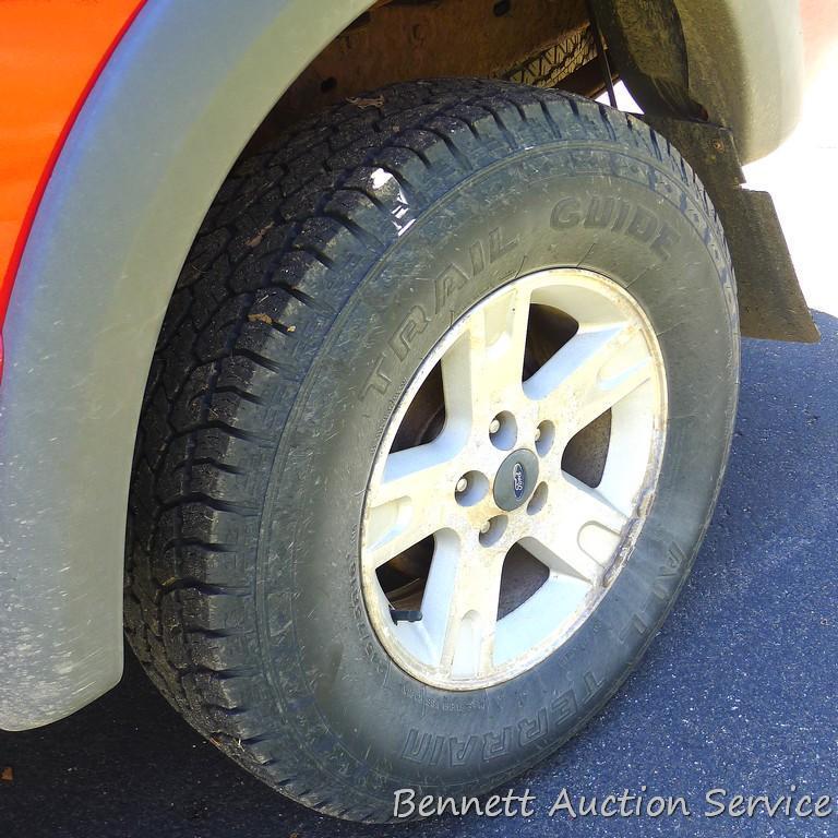 2002 Ford Ranger XLT truck with 103,XXX miles. ABS light is on. Seller says the brakes make some