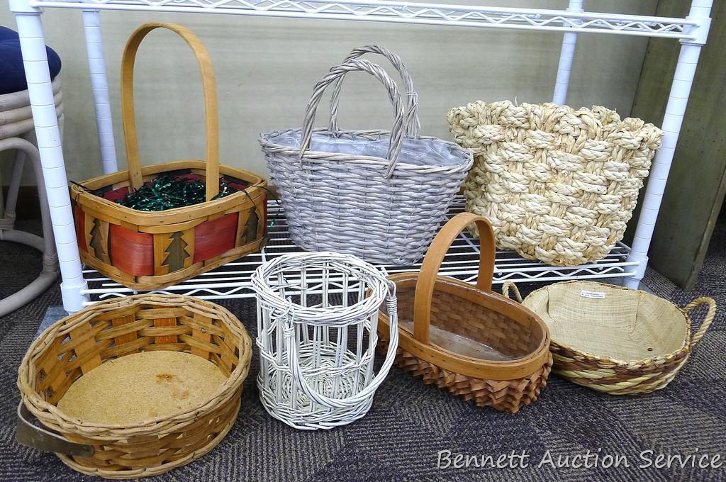 Group of 7 baskets, some are perfect for gift baskets; the largest measures 12"d x 10" tall.